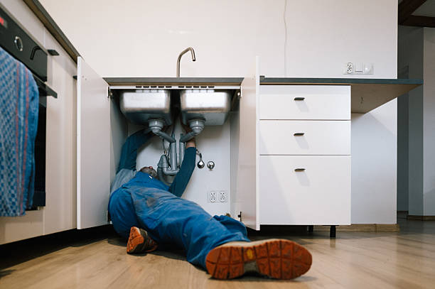 Professional Drain Cleaning technician working in Baker City, OR